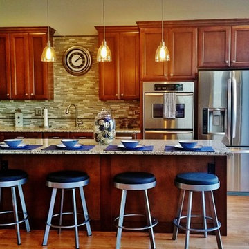 Open Concept Kitchen with Refaced Cherry Cabinets and Island
