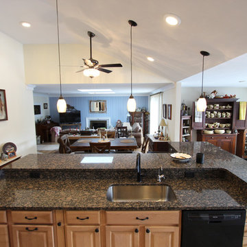 Open Concept Kitchen with Vaulted Ceiling and Waypoint Living Spaces Island