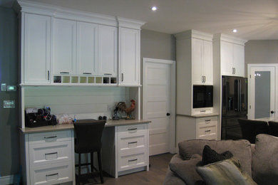 Example of a transitional kitchen design in Toronto