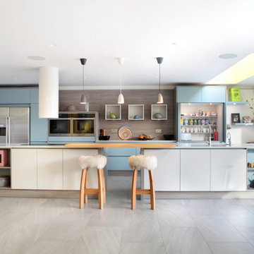 Open plan, matt grey & blue kitchen