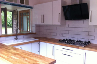 This is an example of a modern kitchen in Manchester.