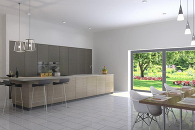 Design ideas for a large contemporary single-wall kitchen/diner in Kent with a submerged sink, flat-panel cabinets, light wood cabinets, composite countertops, coloured appliances, porcelain flooring, an island and black worktops.