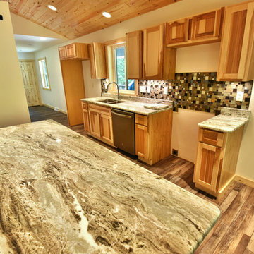 Open Rustic Kitchen with Marble Countertops