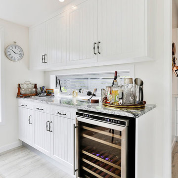 Open scullery with wine cabinet