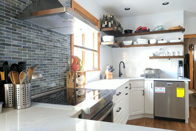Open-shelving and subway tile add city flair to gorgeous white cabinets