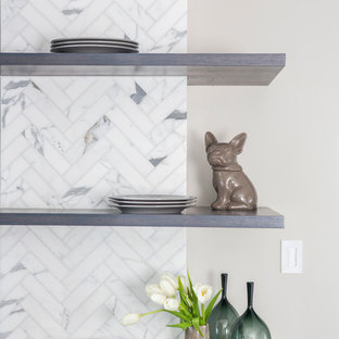 Inspiration for a large country u-shaped eat-in kitchen in Baltimore with an undermount sink, open cabinets, medium wood cabinets, marble benchtops, white splashback, marble splashback, stainless steel appliances, bamboo floors, with island and grey floor.