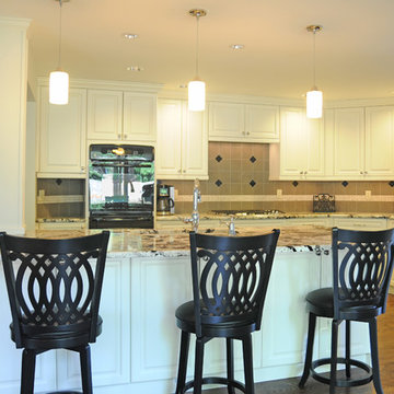Open White Transitional Kitchen with Black Appliances