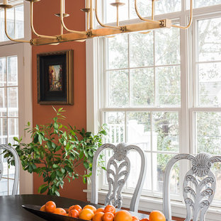 Large eclectic l-shaped eat-in kitchen in St Louis with an undermount sink, raised-panel cabinets, grey cabinets, granite benchtops, grey splashback, mosaic tile splashback, stainless steel appliances, medium hardwood floors, with island, brown floor and orange benchtop.