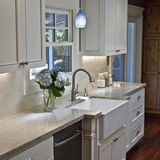 Kitchen - traditional kitchen idea in San Francisco with subway tile backsplash and a farmhouse sink
