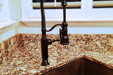 Eat-in kitchen - industrial eat-in kitchen idea in Orlando with an undermount sink and granite countertops