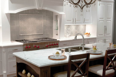 Inspiration for a mid-sized timeless galley eat-in kitchen remodel in Other with beaded inset cabinets, white cabinets, marble countertops, gray backsplash and an island