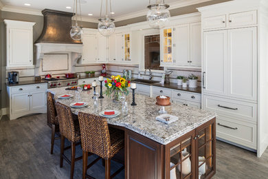 Large transitional l-shaped ceramic tile and gray floor enclosed kitchen photo in Minneapolis with an undermount sink, beaded inset cabinets, white cabinets, quartz countertops, multicolored backsplash, subway tile backsplash, paneled appliances and an island