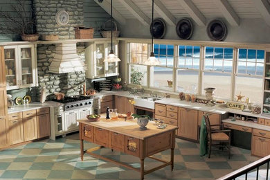 Large cottage chic l-shaped painted wood floor open concept kitchen photo in Other with a farmhouse sink, beaded inset cabinets, light wood cabinets, quartzite countertops, blue backsplash, stainless steel appliances and an island