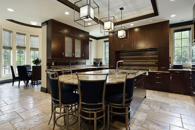 Photo of a large kitchen in Detroit with granite worktops and an island.