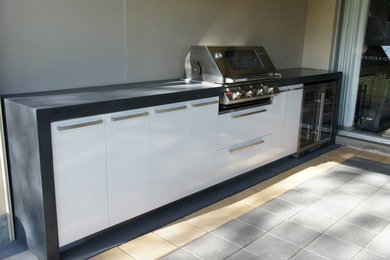 Outdoor Kitchen | polished concrete benchtop with waterfall ends