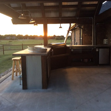 Outdoor kitchen with arbor