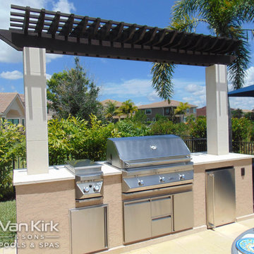 Outdoor Kitchen with Small Pergola For Classic Straight Edge in Parkland, Florid