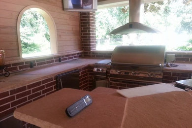 Photo of a rustic kitchen in Houston.