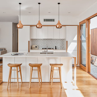 This is an example of a contemporary kitchen in Brisbane.
