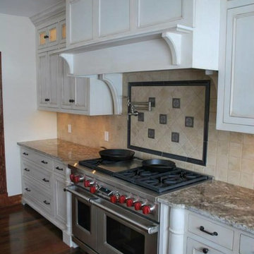 Painted and glazed cabinetry with turned "half" columns