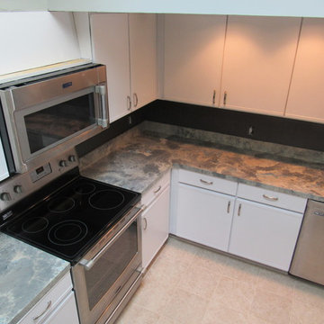 Painted cabinets, counters and back splash