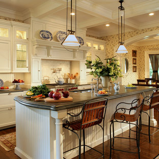 Mid-sized country galley eat-in kitchen in New York with an undermount sink, beaded inset cabinets, white cabinets, panelled appliances and medium hardwood floors.
