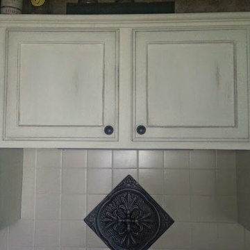 Painted distressed kitchen cabinets