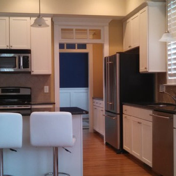 Painted kitchen cabinet to update and make space feel larger