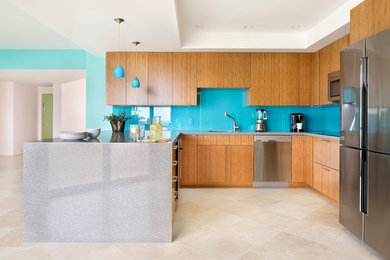 Eat-in kitchen - mid-sized contemporary u-shaped eat-in kitchen idea in Miami with an undermount sink, flat-panel cabinets, medium tone wood cabinets, quartz countertops, blue backsplash, glass sheet backsplash, stainless steel appliances and an island