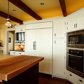 Paneled Refrigerator and Corner Oven Cabinet