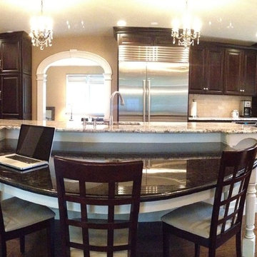Panoramic View of this large kitchen with stainless steel
