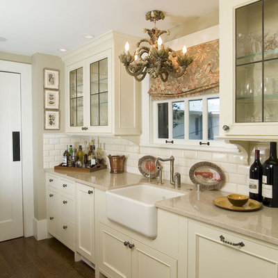 Kitchen - traditional kitchen idea in San Francisco with beaded inset cabinets, a farmhouse sink, beige cabinets, white backsplash and subway tile backsplash