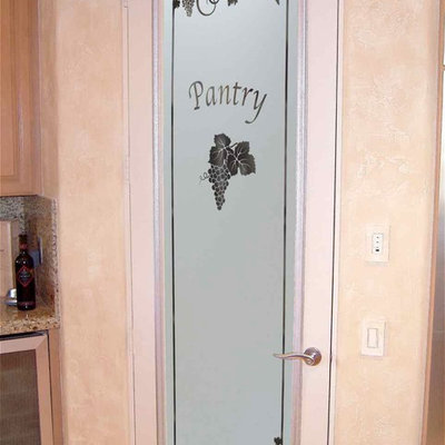 Kitchen pantry - mid-sized eclectic l-shaped kitchen pantry idea in Other with raised-panel cabinets, medium tone wood cabinets, granite countertops, beige backsplash, ceramic backsplash, stainless steel appliances and an island