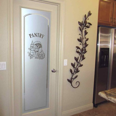 Inspiration for a mid-sized eclectic l-shaped kitchen pantry remodel in Other with raised-panel cabinets, medium tone wood cabinets, granite countertops, beige backsplash, ceramic backsplash, stainless steel appliances and an island