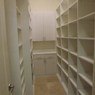 Small traditional kitchen pantry appliance - Kitchen pantry - small traditional galley ceramic tile kitchen pantry idea in Tampa with open cabinets, white cabinets, laminate countertops, white backsplash and wood backsplash