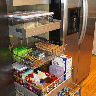 Small contemporary u-shaped kitchen pantry in Richmond with a single-bowl sink, flat-panel cabinets, dark wood cabinets, green splashback, stainless steel appliances, no island and medium hardwood flooring.