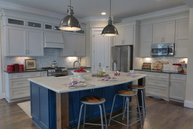 Eat-in kitchen - modern l-shaped dark wood floor eat-in kitchen idea in Richmond with a farmhouse sink, shaker cabinets, blue cabinets, granite countertops, white backsplash, mosaic tile backsplash, stainless steel appliances and an island