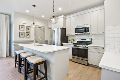 Example of a transitional kitchen design in Salt Lake City