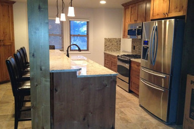 Kitchen photo in Salt Lake City with stainless steel appliances