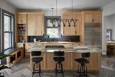 Kitchen - large transitional porcelain tile and brown floor kitchen idea in Other with a single-bowl sink, shaker cabinets, light wood cabinets, granite countertops, stainless steel appliances, black backsplash, subway tile backsplash, an island and multicolored countertops