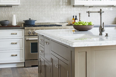 Inspiration for a traditional kitchen in Los Angeles with grey splashback, ceramic splashback, porcelain flooring and an island.