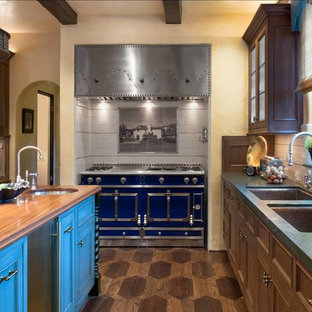 Mediterranean kitchen photos - Kitchen - mediterranean kitchen idea in Los Angeles with glass-front cabinets, wood countertops, colored appliances, blue cabinets and an undermount sink