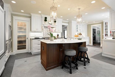 Large elegant l-shaped ceramic tile and gray floor open concept kitchen photo in Other with shaker cabinets, white cabinets, white backsplash, porcelain backsplash, stainless steel appliances and an island