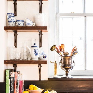 Design ideas for a mid-sized eclectic u-shaped eat-in kitchen in New York with a double-bowl sink, open cabinets, dark wood cabinets, zinc benchtops, brown splashback, timber splashback, stainless steel appliances, painted wood floors, multiple islands and beige floor.
