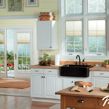 Pella® Designer Series® casement windows, patio doors provide clean look