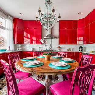 Eclectic eat-in kitchen photos - Example of an eclectic u-shaped multicolored floor eat-in kitchen design in Atlanta with an undermount sink, flat-panel cabinets, red cabinets, white backsplash, subway tile backsplash, stainless steel appliances, no island and gray countertops