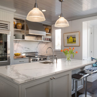 Design ideas for a traditional kitchen in San Francisco with stainless steel appliances, grey cabinets, marble worktops and marble splashback.