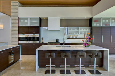 Trendy kitchen photo in Phoenix with stainless steel appliances and an island