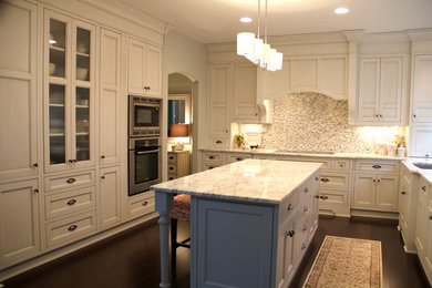 Kitchen pantry - mid-sized transitional u-shaped dark wood floor kitchen pantry idea in Philadelphia with an undermount sink, shaker cabinets, white cabinets, marble countertops, multicolored backsplash, mosaic tile backsplash, stainless steel appliances and an island
