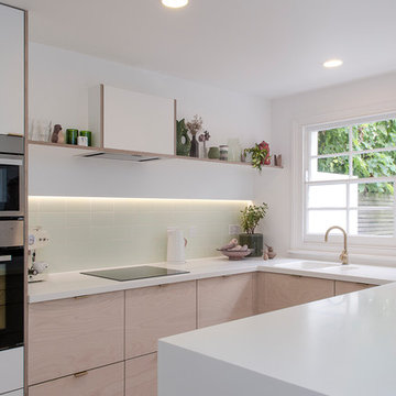 Plywood and Corian kitchen